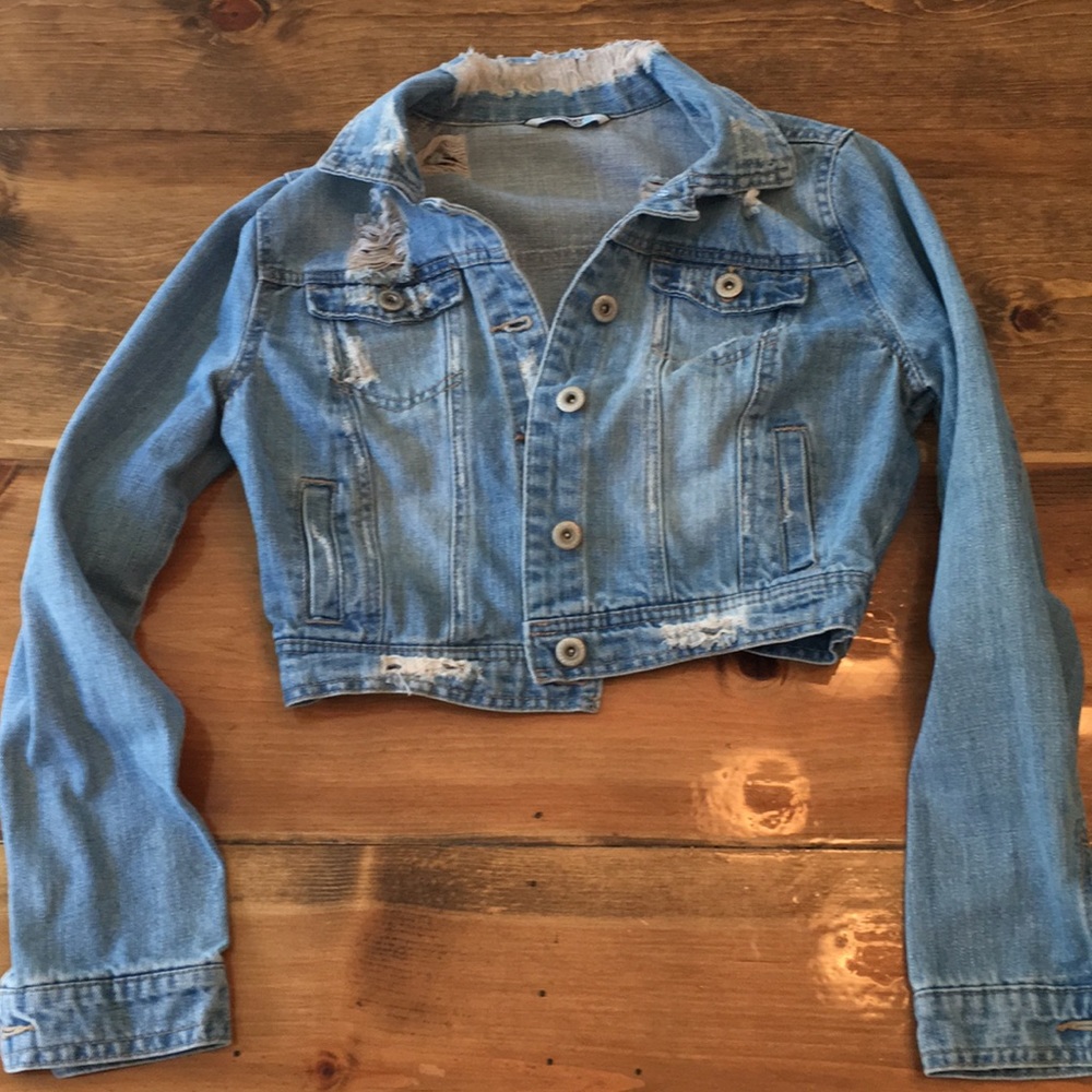 Crop length distressed jean jacket